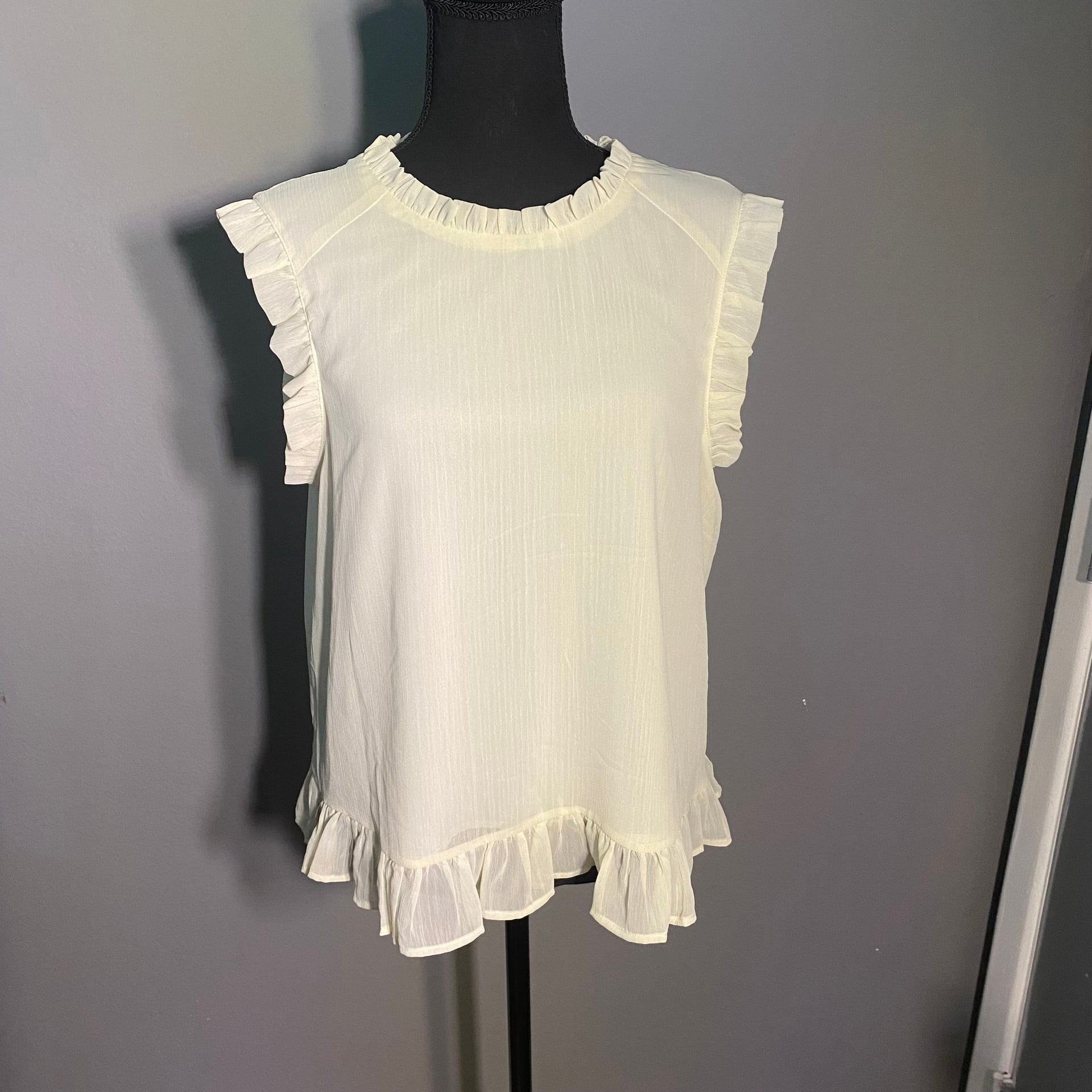 Pleione Sleeveless Ruffle Blouse in Cream 2