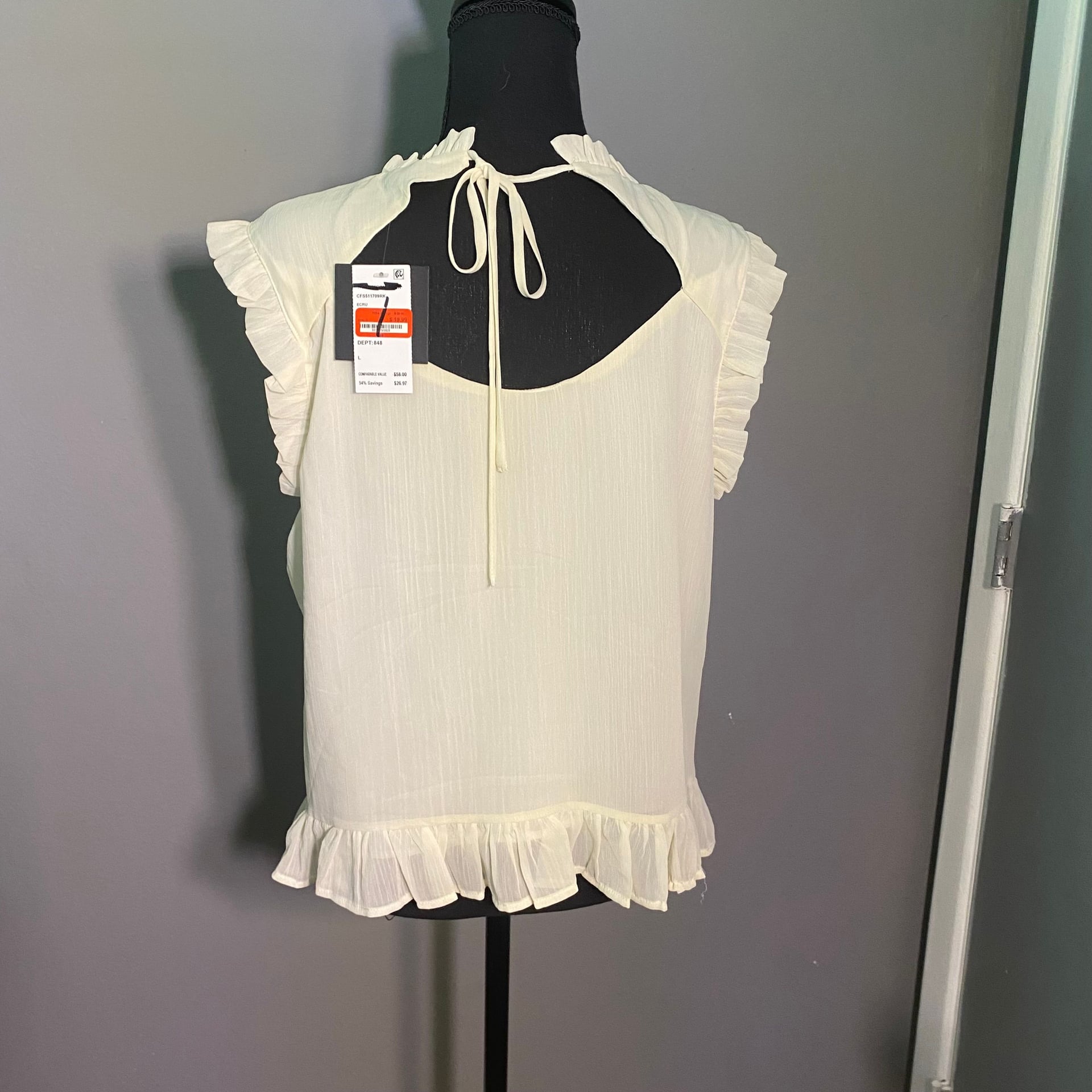 Pleione Sleeveless Ruffle Blouse in Cream 3