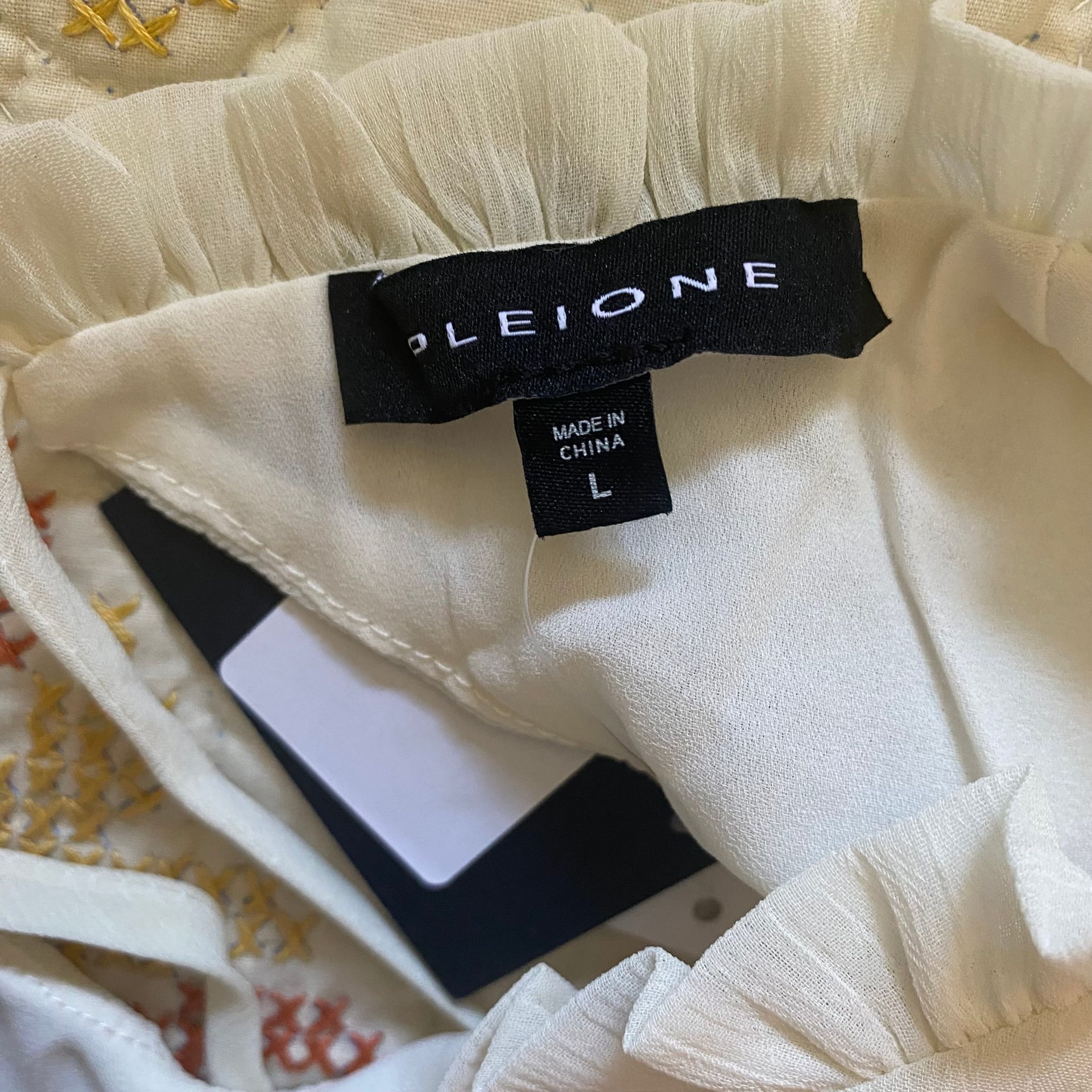 Pleione Sleeveless Ruffle Blouse in Cream 4
