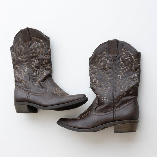 Description: Brown Rampage boots with mid-calf...