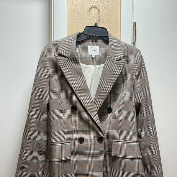 a love a   Plaid 6-Button Notch Lapel Long Sleeve Jacket bought from Dillard’s never worn