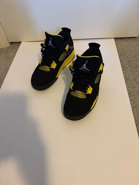 Jordan 4 Retro Thunder Black Tour Yellow Sneakers