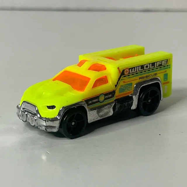 Hot Wheels Rescue Duty Wildlife Yellow Diecast Toy Car