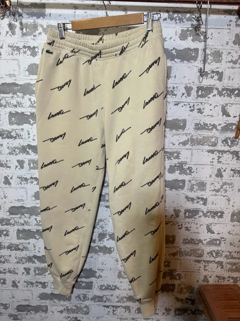 Lacoste print all over cream joggers M