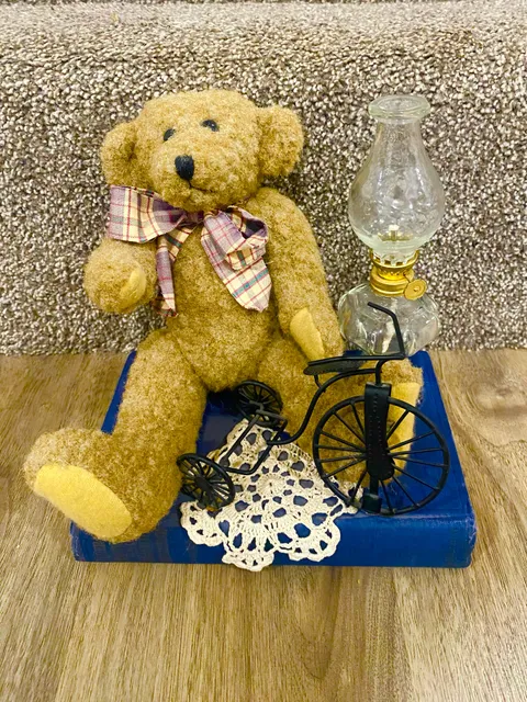 Boyds Bear Figurine With A Bike, On A Book.