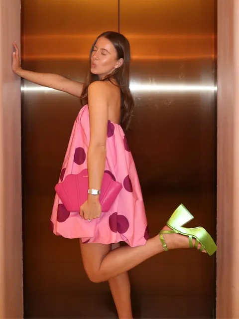 Sleeveless Polka Dot Puff Hem Mini Dress .