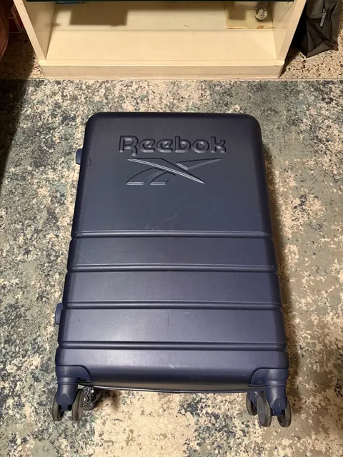 Reebok Navy Hard-Shell Spinner Suitcase – Checked Bag – Used