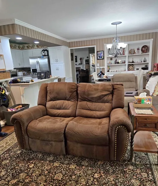 Brown Microfiber Reclining Loveseat with Nailhead Trim