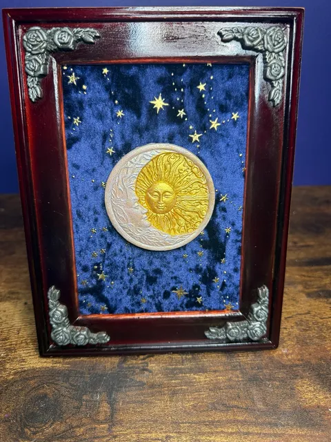 Handmade framed celestial focal on blue galaxy velvet.