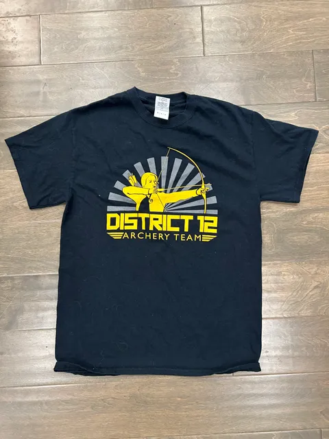 The Hunger Games Katniss Everdeen in District 12 Seal Black T-Shirt