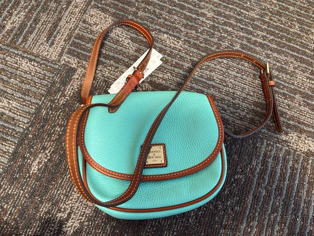 Dooney & Bourke Pebble Grain Saddle Bag Turquoise new tags, warranty card, and dust bag 