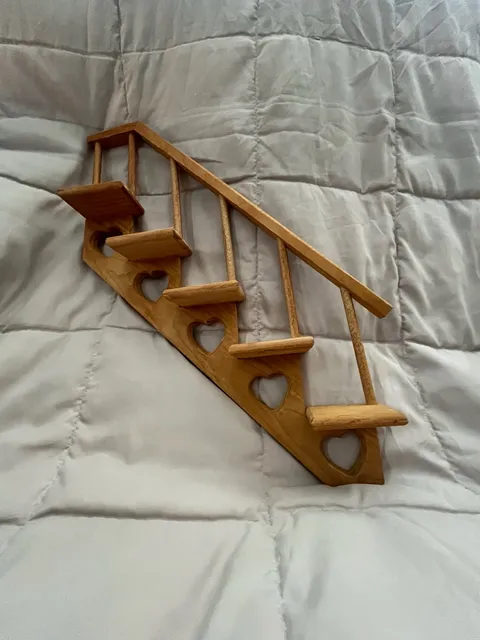 1980s wooden staircase shelf with heart cutouts