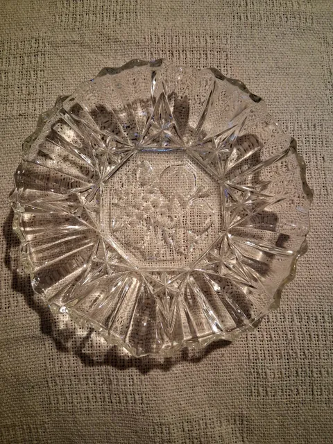 Clear Pressed Glass Dish With Floral Center