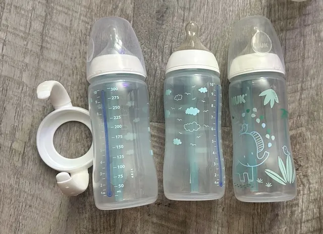 NEVER USED-NUK Baby Bottles Set with Handles and Temperature Control