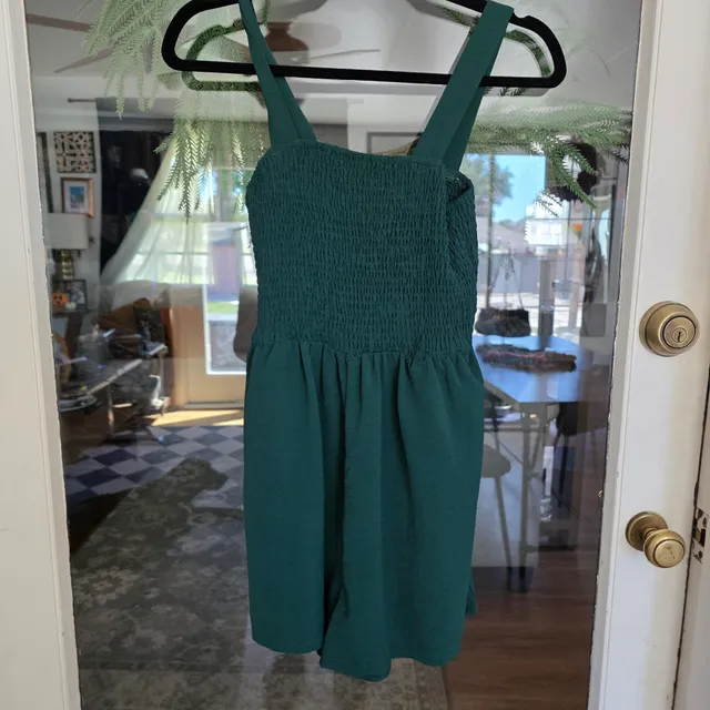 Green Smocked Romper Size small
