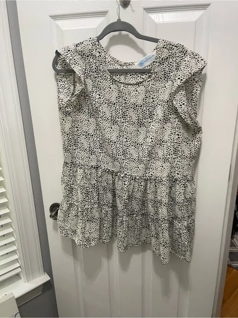Sleeveless Black & White Dotted Ruffle Peplum Blouse