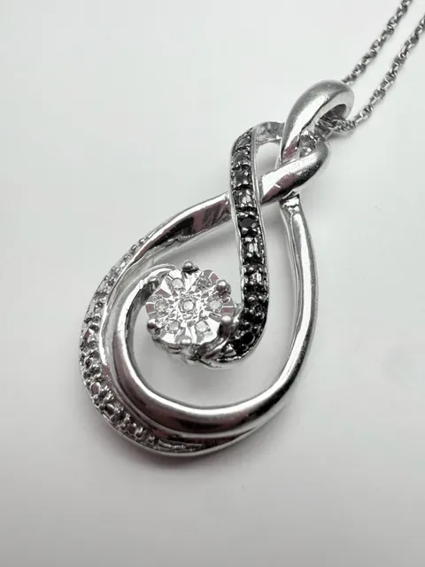Sterling Silver White And Black Diamond Swirl Pendant Necklace
