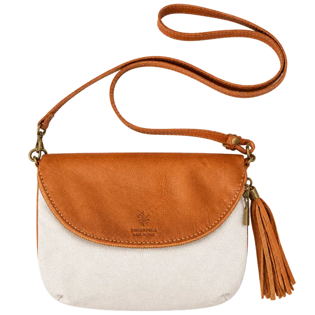 Beautiful Borse in Pelle foldover crossbody bag. Handcrafted in Italy & made of 100% Genuine Italian Calfskin Leather. Has bohemian-style colorblock design that combines a rich cognac brown (top leather flap) with a clean white leather body for a stunning