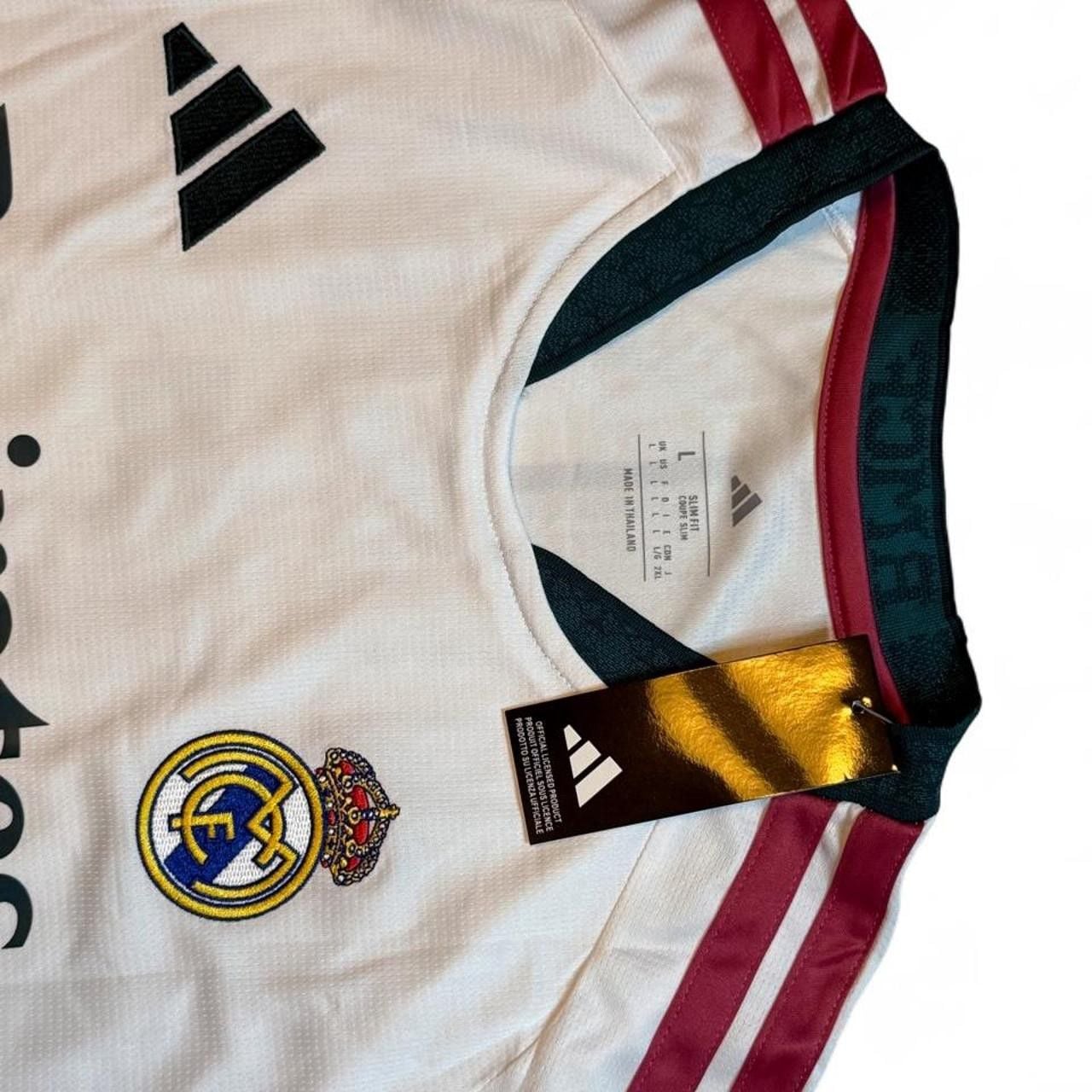 Adidas Real Madrid 2026/27 Home Jersey White with maroon and green stripes on shoulders and sleeves number 5 Bellingham on the back size Large dimensions in the pictures brand new with tags. 7