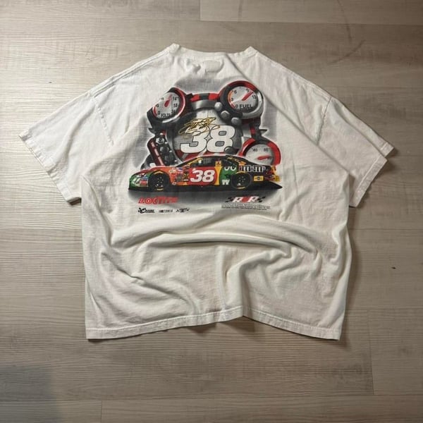 🔥 Vintage NASCAR 38 Racing Tee – Rare & Bold 🔥

Rev up your style with this vintage 38 M&M’s NASCAR tee featuring an iconic race car graphic and bold racing gauges on the back! This single-stitch, Y2K-era gem is perfect for motorsport lovers, s