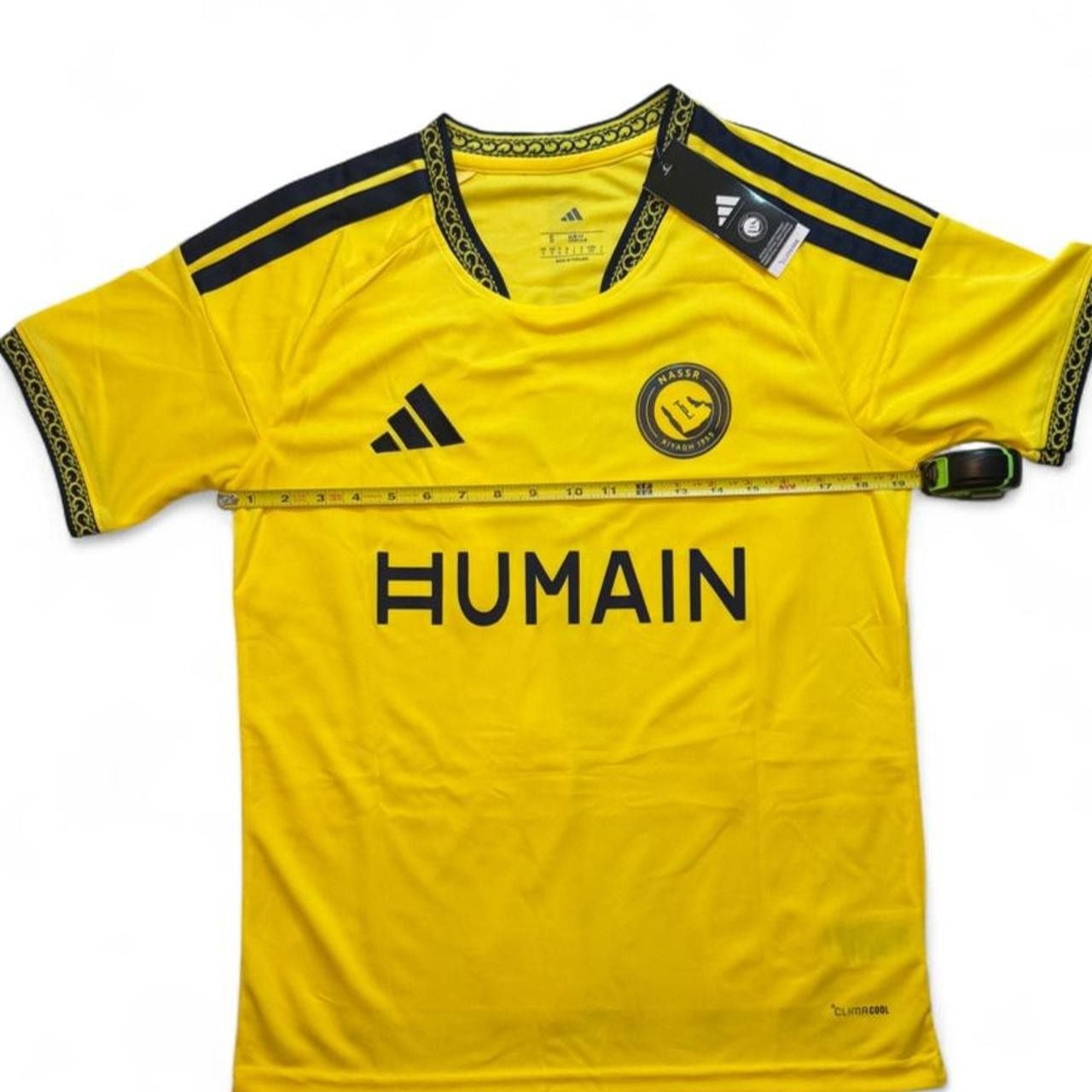 Adidas Al Nassr 2026/27 home jersey in yellow with black stripes on shoulders and black trim on collar and sleeves number 7 Ronaldo on the back size small dimensions are in the pictures brand new with tags. 4
