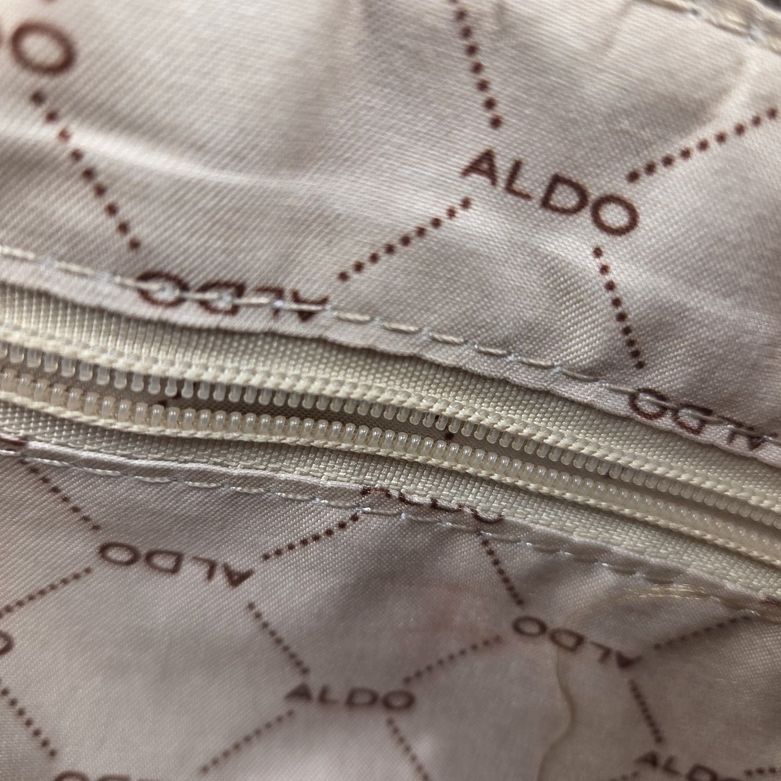ALDO Brown Embossed Logo Crossbody Bag Zip Closure Adjustable Strap Pockets 8