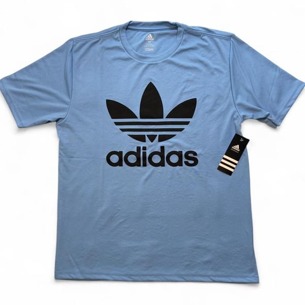 Adidas Originals blue polyester & cotton t-shirt with black trefoil logo size medium dimensions are in the pictures brand new with tags.