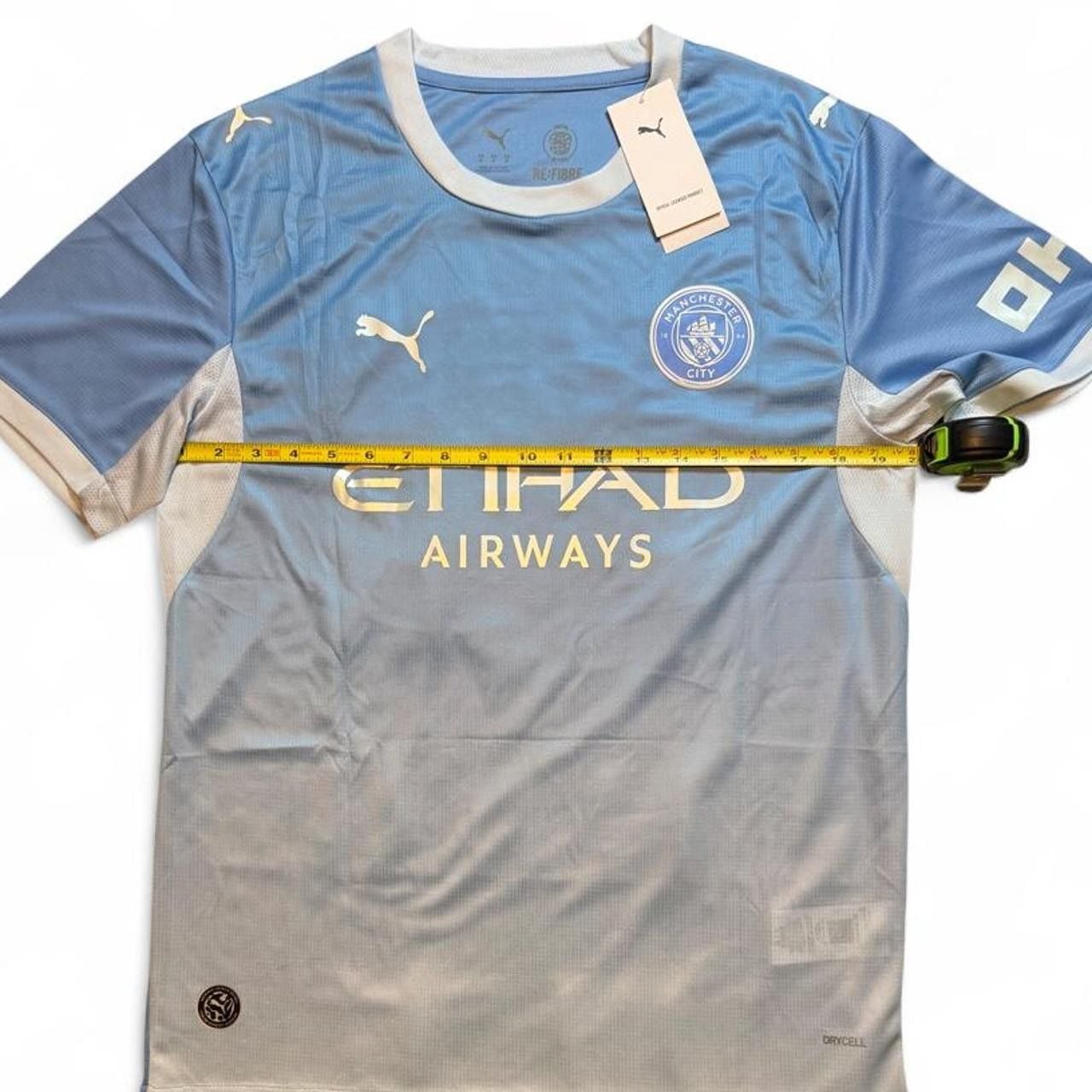 Puma Manchester City 2026/27 home shirt in light blue with white accents number nine Haaland on the back size medium dimensions are in the pictures brand new with tags 4
