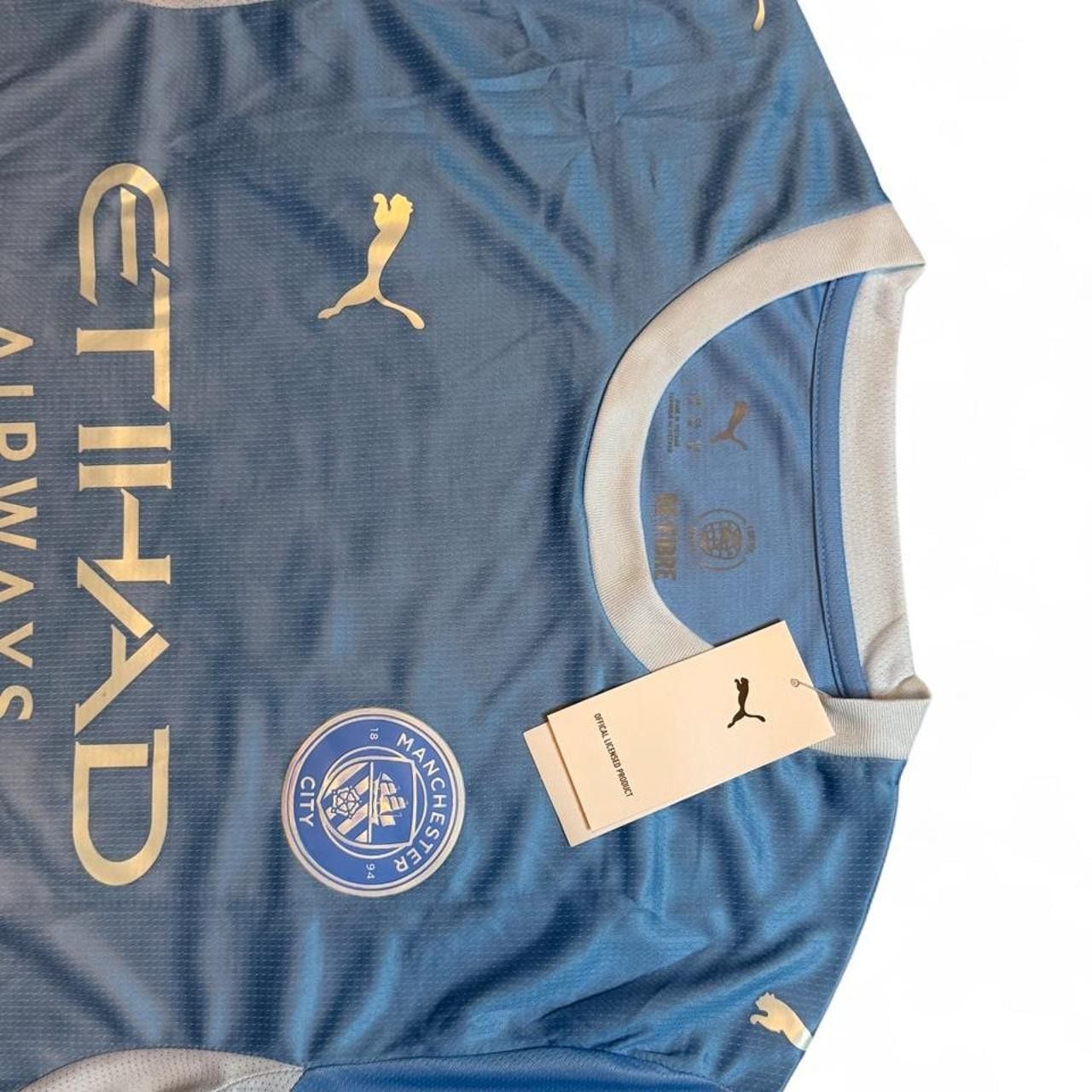 Puma Manchester City 2026/27 home shirt in light blue with white accents number nine Haaland on the back size medium dimensions are in the pictures brand new with tags 7
