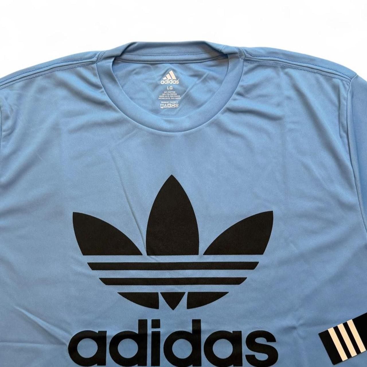 Adidas Originals blue polyester & cotton t-shirt with black logo size large dimensions in pictures brand new with tags. 5