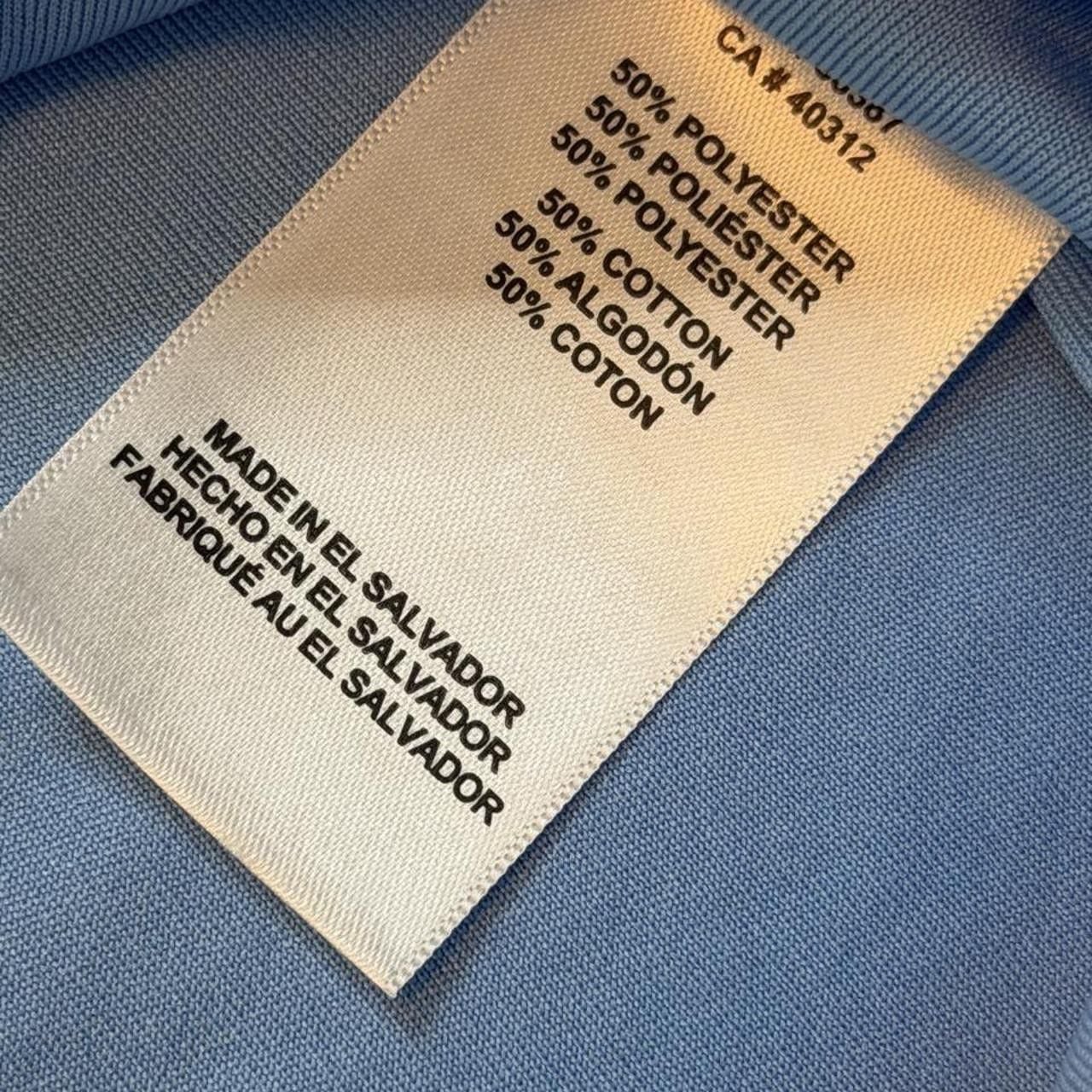 Adidas Originals blue polyester & cotton t-shirt with black trefoil logo size medium dimensions are in the pictures brand new with tags. 7