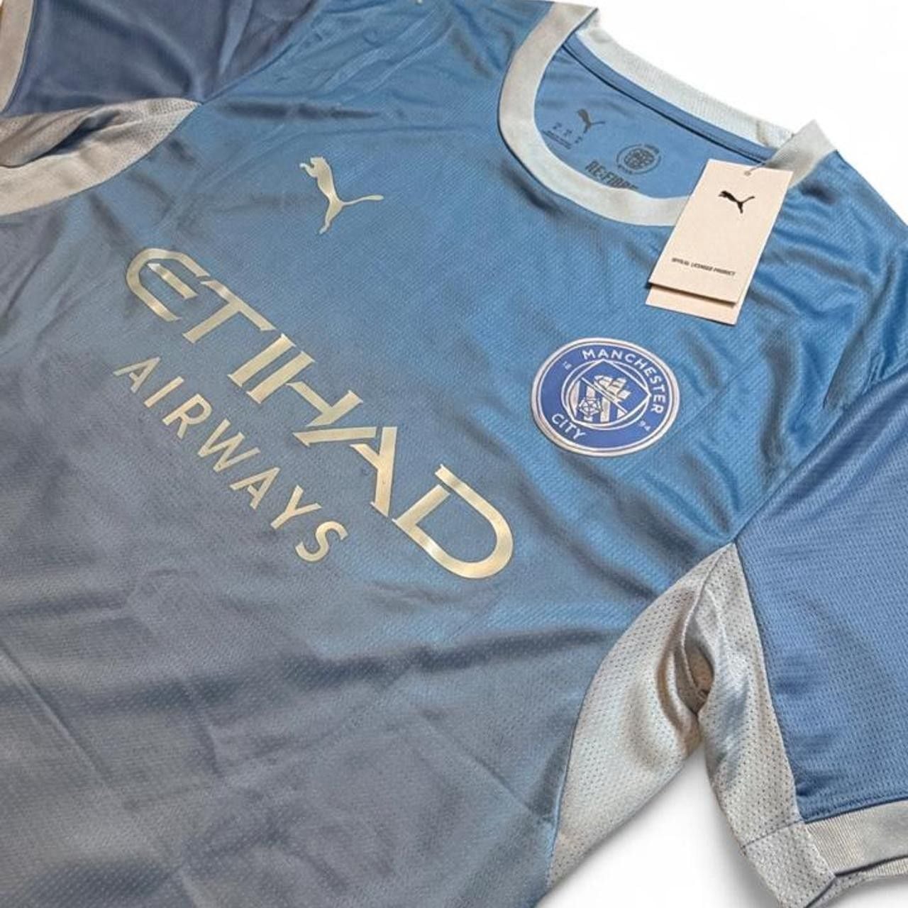 Puma Manchester City 2026/27 home shirt in light blue with white accents number nine Haaland on the back size medium dimensions are in the pictures brand new with tags 6