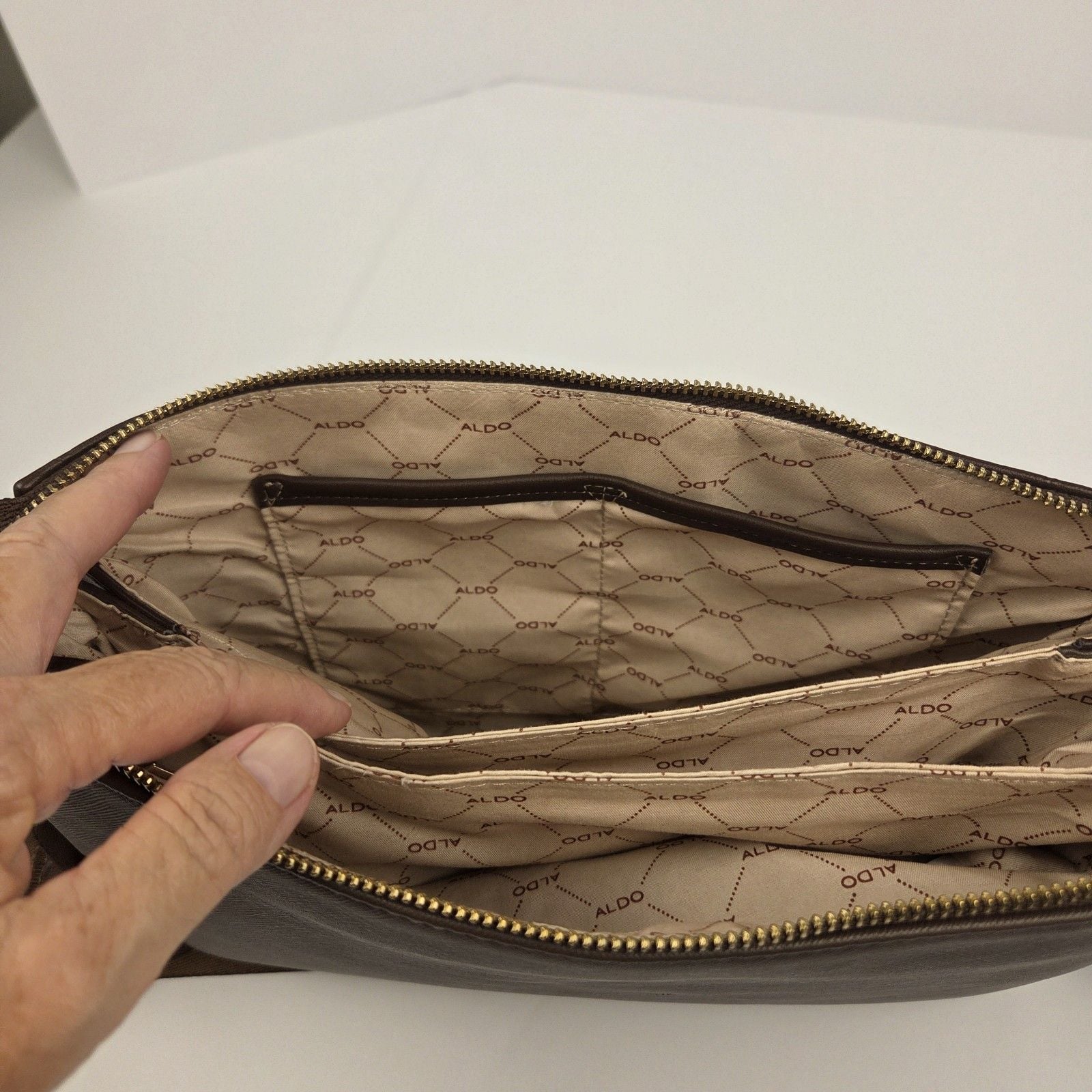 ALDO Brown Embossed Logo Crossbody Bag Zip Closure Adjustable Strap Pockets 6