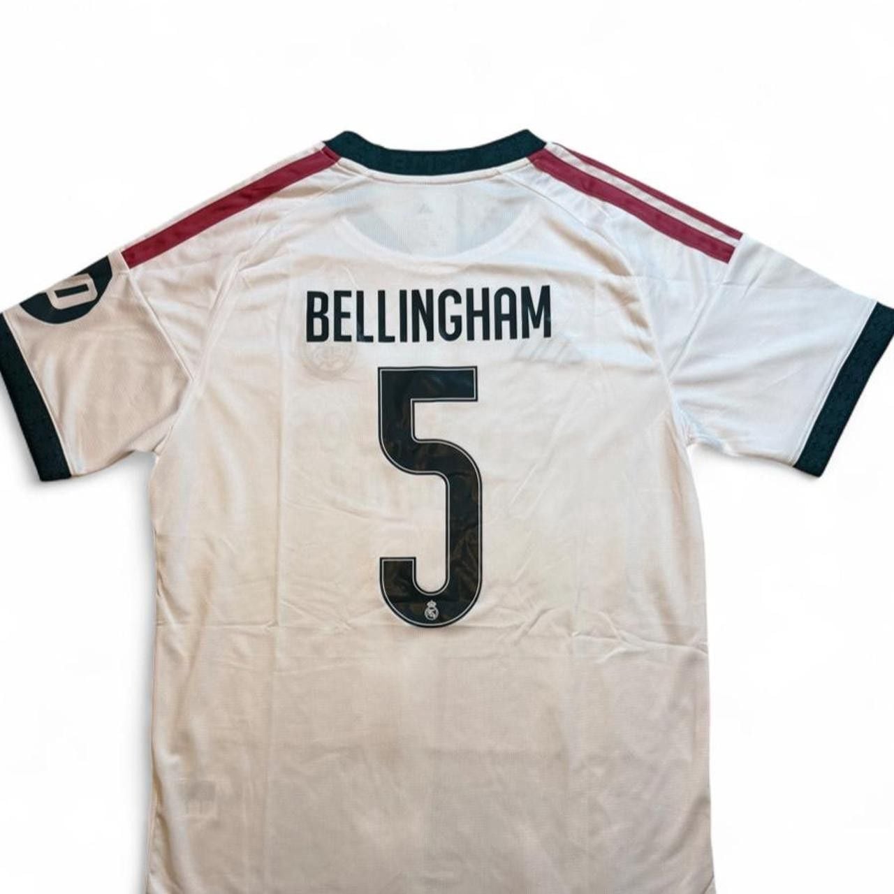 Adidas Real Madrid 2026/27 Home Jersey White with maroon and green stripes on shoulders and sleeves number 5 Bellingham on the back size Large dimensions in the pictures brand new with tags. 8