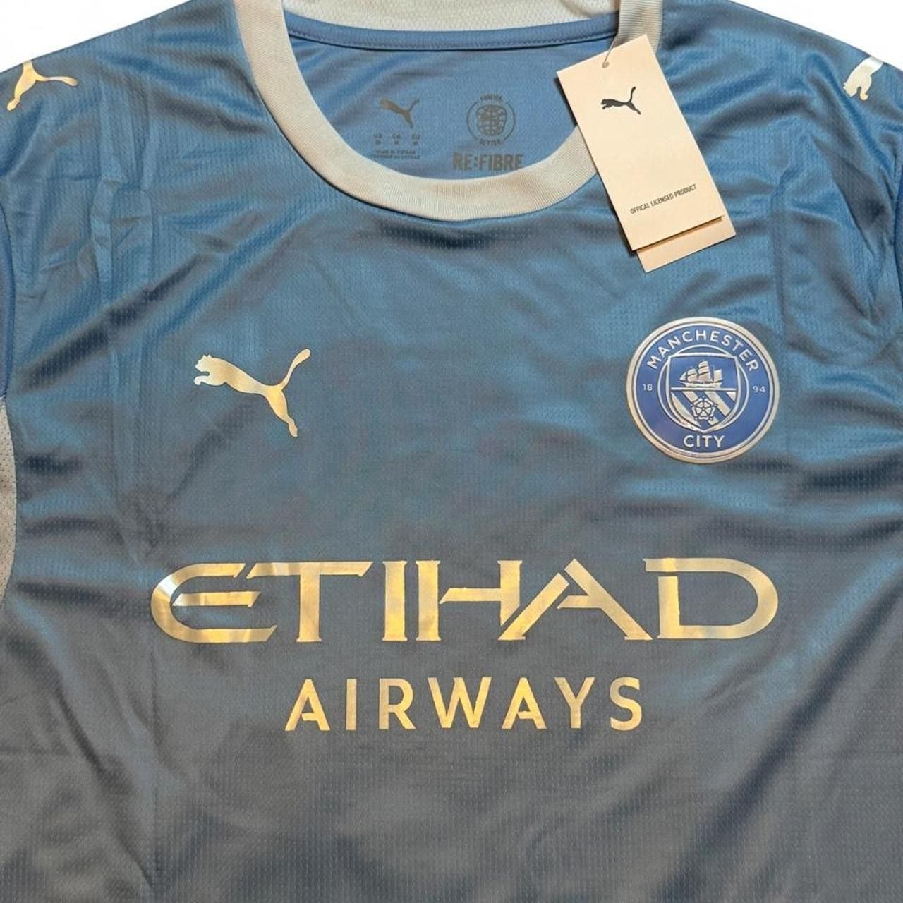 Puma Manchester City 2026/27 home shirt in light blue with white accents number nine Haaland on the back size medium dimensions are in the pictures brand new with tags 5