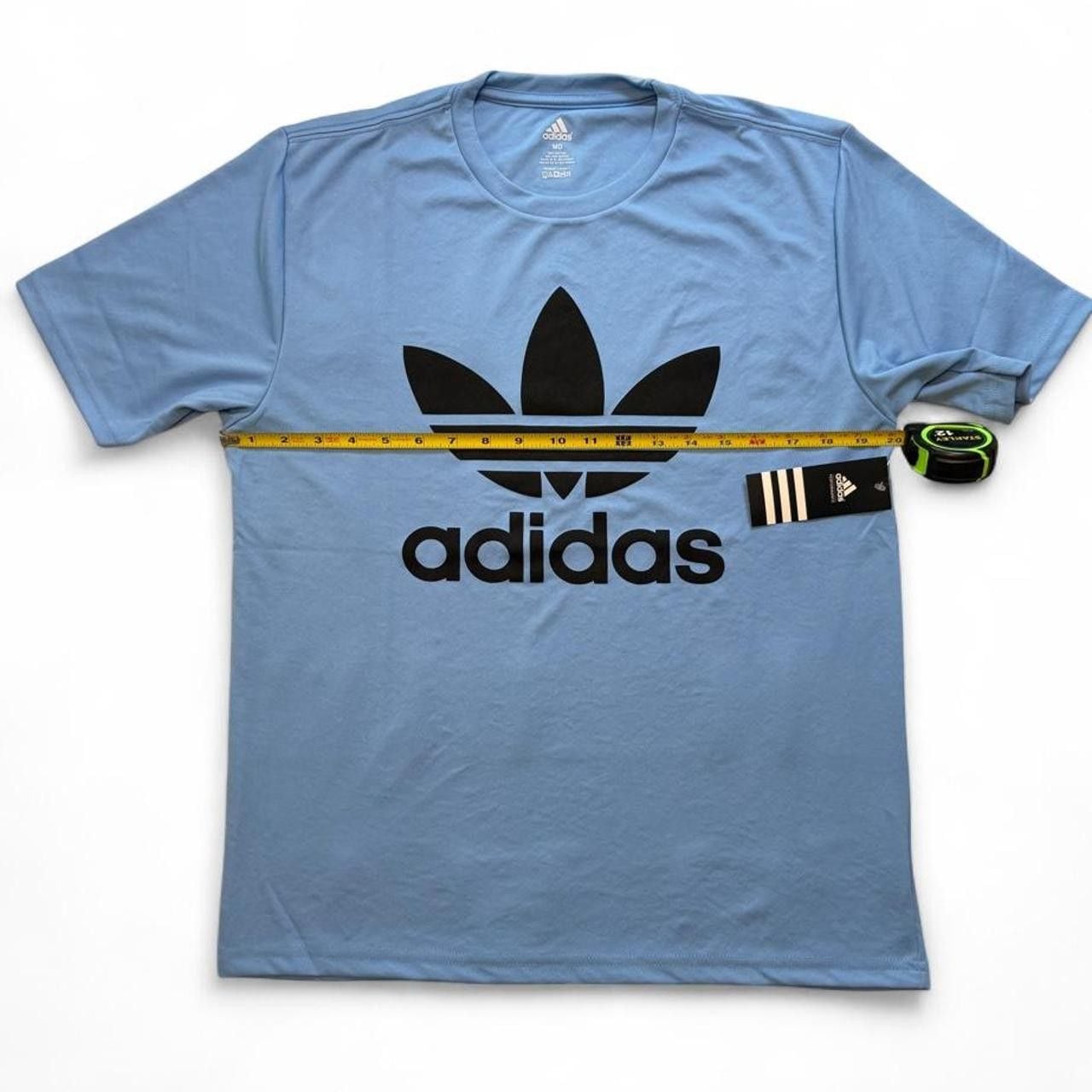 Adidas Originals blue polyester & cotton t-shirt with black trefoil logo size medium dimensions are in the pictures brand new with tags. 4