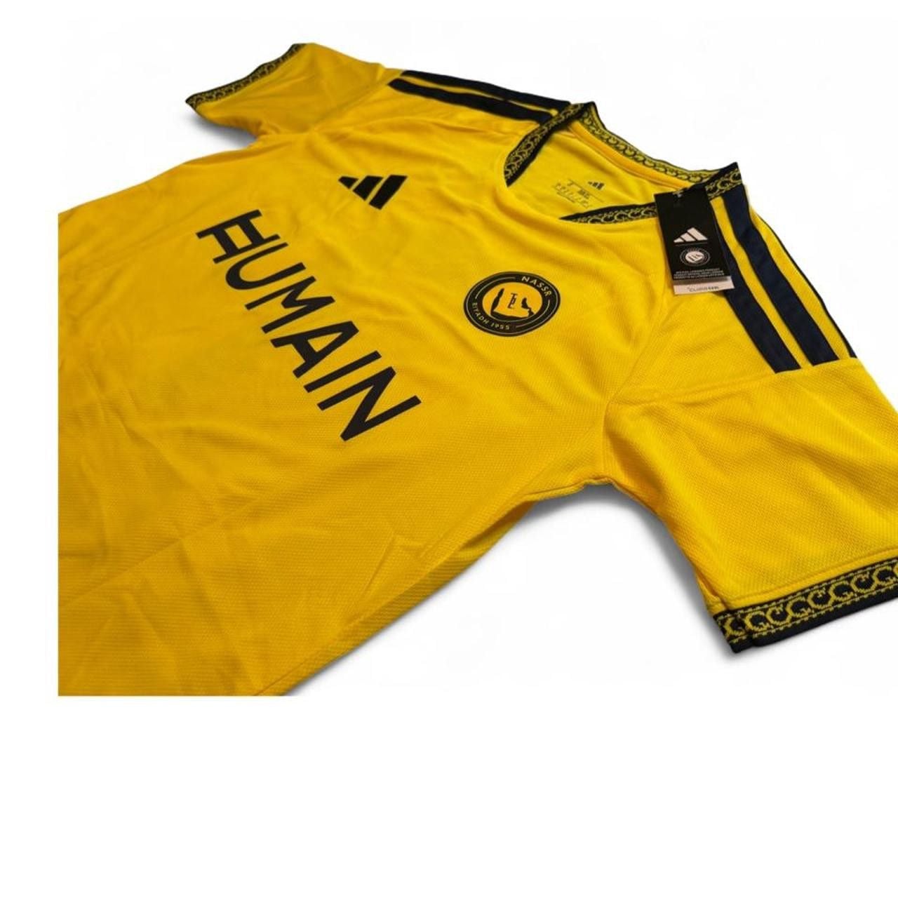 Adidas Al Nassr 2026/27 home jersey in yellow with black stripes on shoulders and black trim on collar and sleeves number 7 Ronaldo on the back size small dimensions are in the pictures brand new with tags. 6