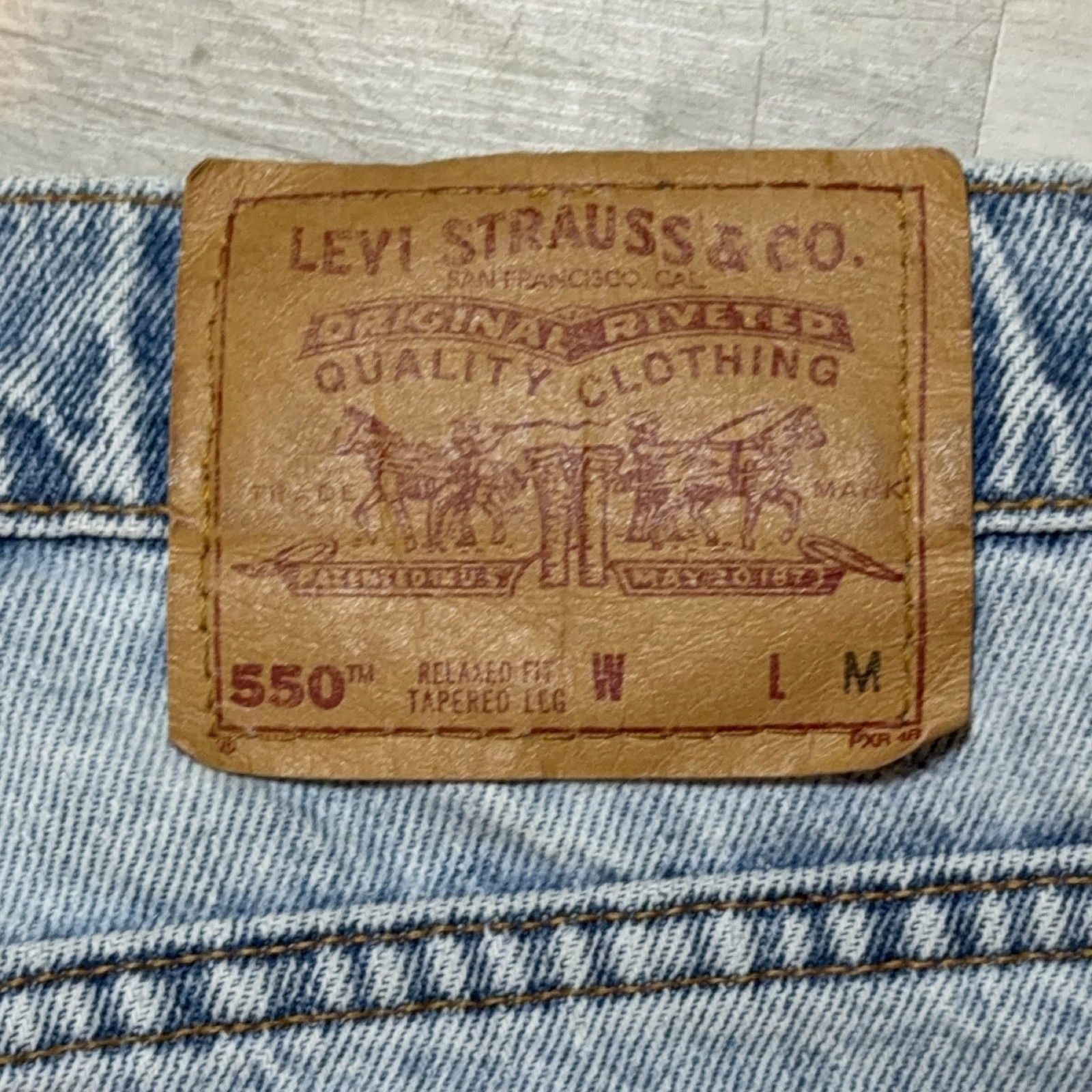 Vintage MADE USA Levi's 550 Jeans Men's M Relaxed Tapered Light Wash Blue Denim 11