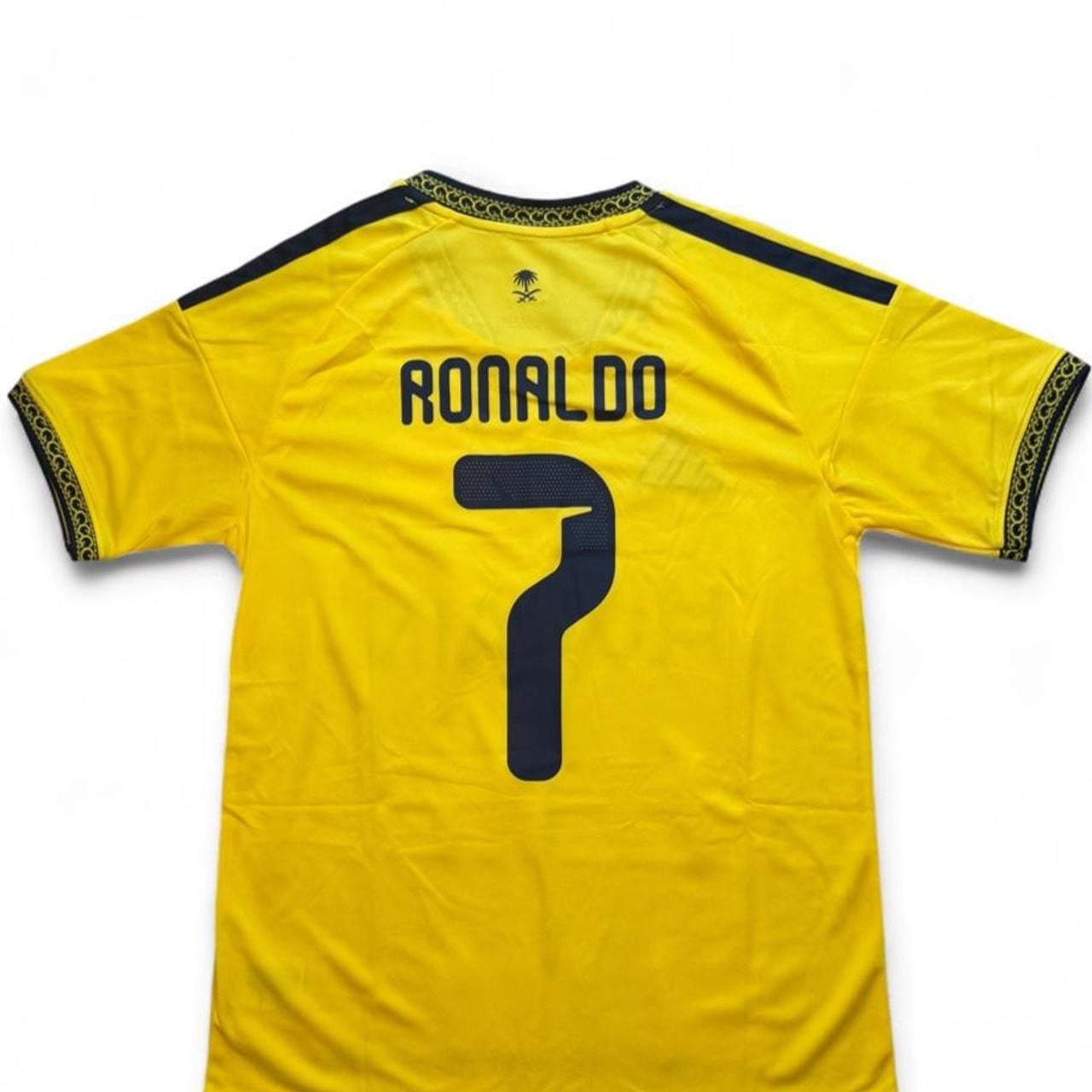 Adidas Al Nassr 2026/27 home jersey in yellow with black stripes on shoulders and black trim on collar and sleeves number 7 Ronaldo on the back size small dimensions are in the pictures brand new with tags. 8
