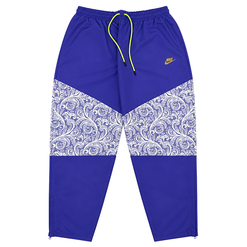 Nike Women's Sportswear Lapis Blue Paisley Lace Inset Track Pants DR6702-430 fit on men’s size Large. 1