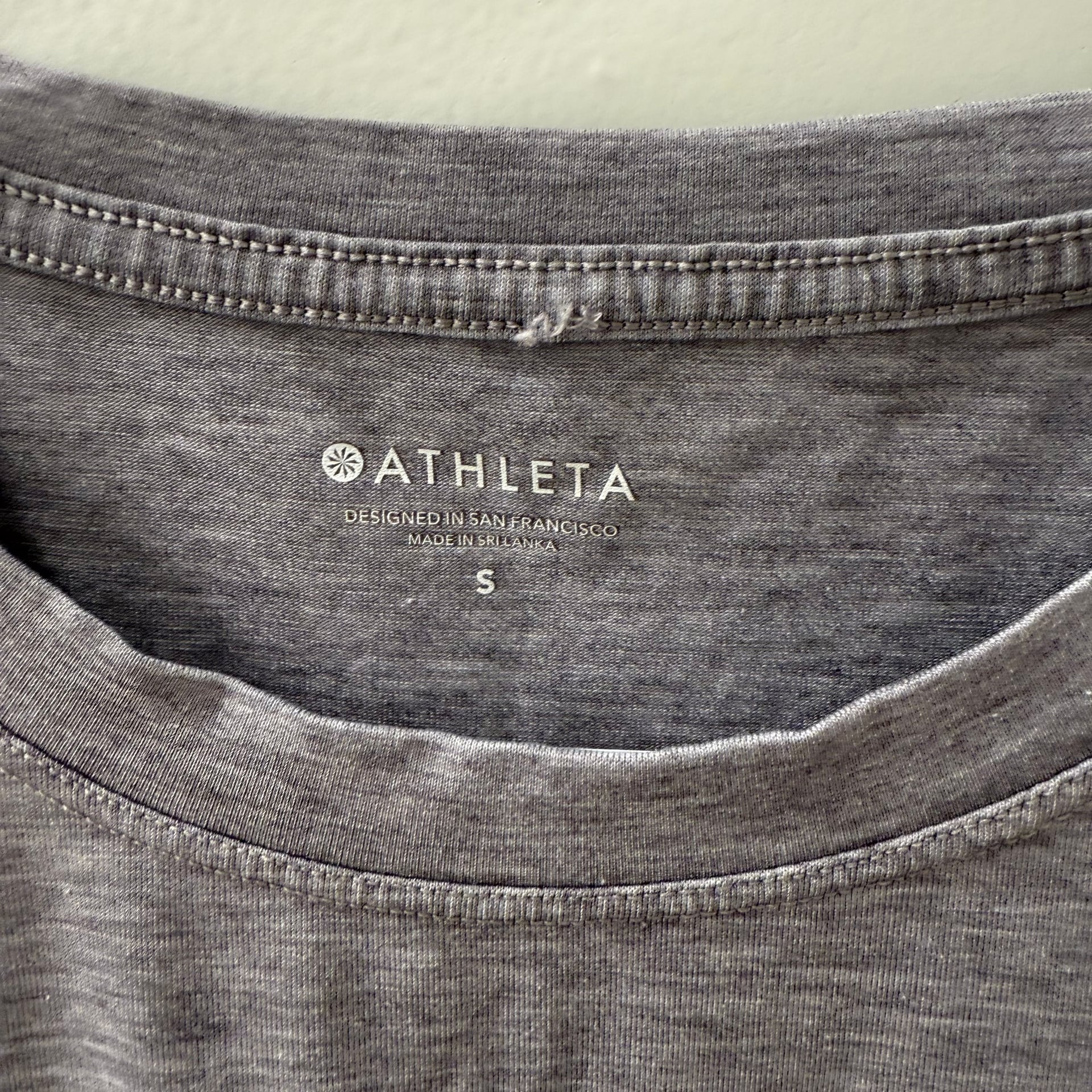 Athleta women’s gray workout tank top. 4