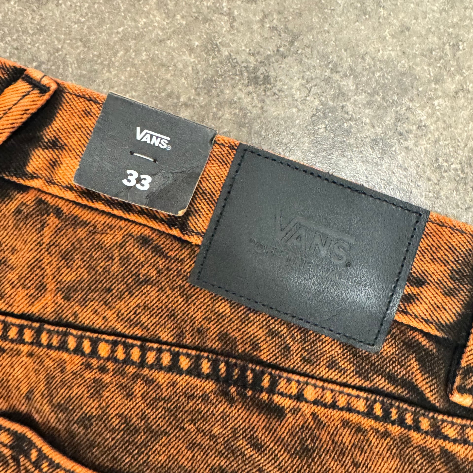 Vans baggy orange and black jeans size 33 5