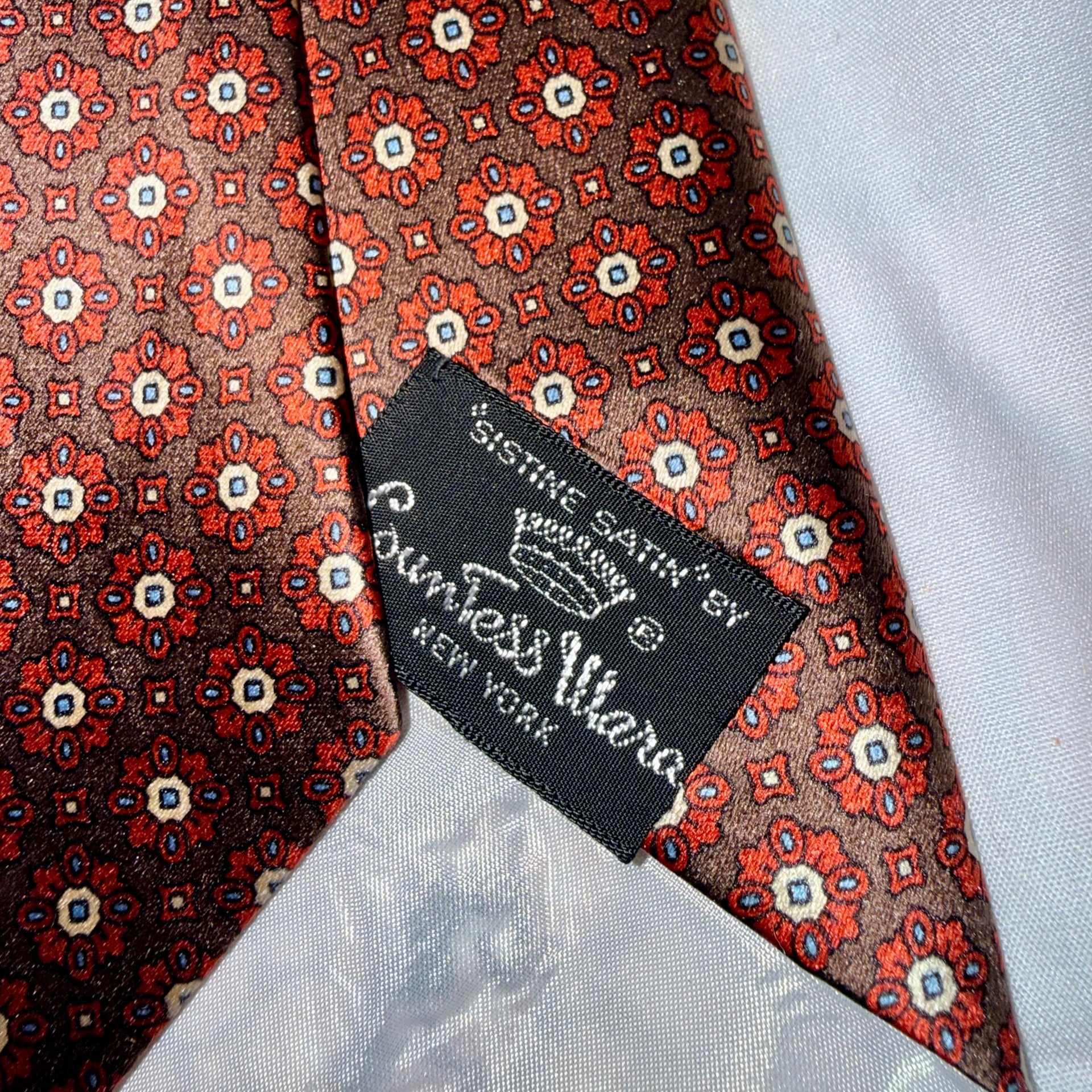 Bullock said Jones San Francisco Brown & Orange Geometric Floral Medallion 100% Silk Tie.. 4