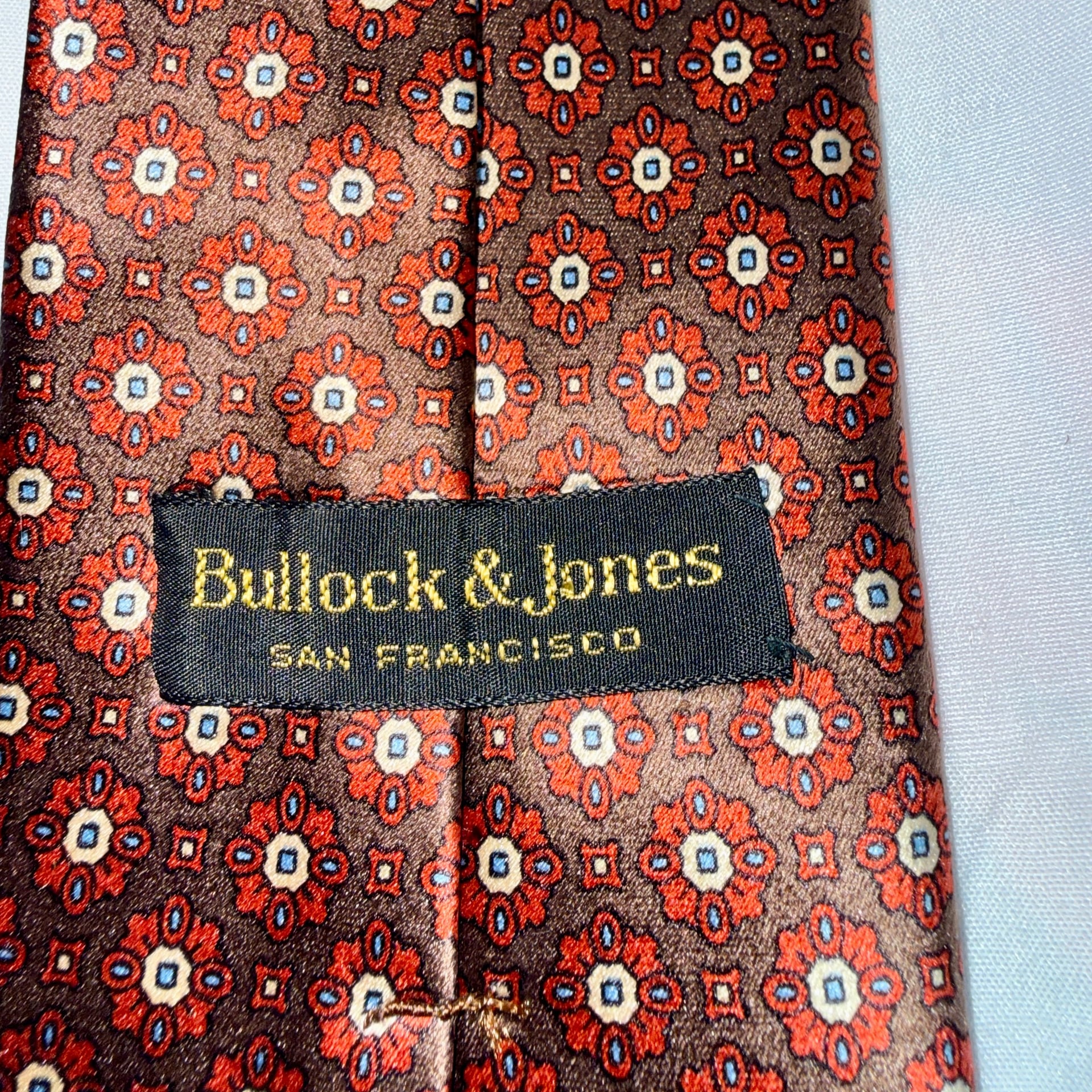 Bullock said Jones San Francisco Brown & Orange Geometric Floral Medallion 100% Silk Tie.. 5