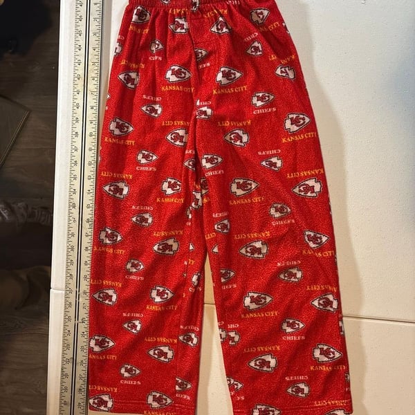 NFL Team Apparel Youth Kansas City Chiefs All-Over Print Fleece Pajama Pants Red
