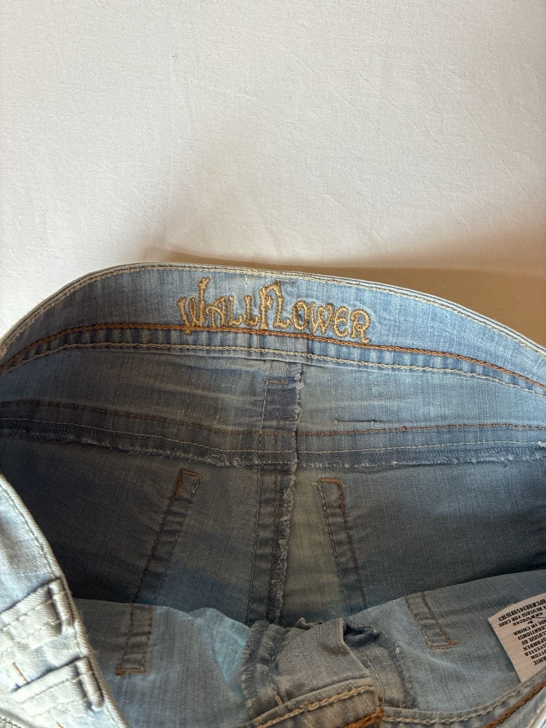 WallFlower High Rise Light Wash Y2K Denim Cutoff Shorts with Flap Pockets 3