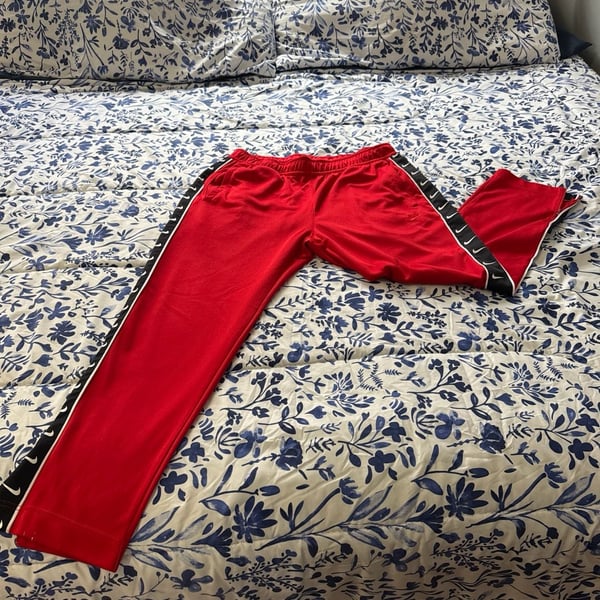 Nike Red Sportswear Taped Polyknit Track Pants with Swoosh Side Stripe