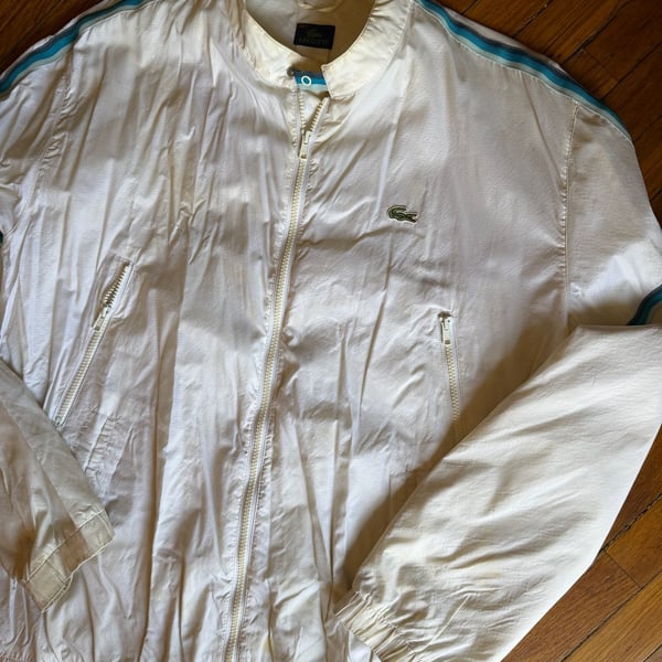 Vintage Lacoste Sport White Windbreaker Jacket with Stripe Detail