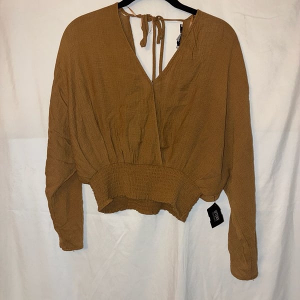 Kirious V-Neck Smocked Waist Long Sleeve Open Back Tie Crop Top