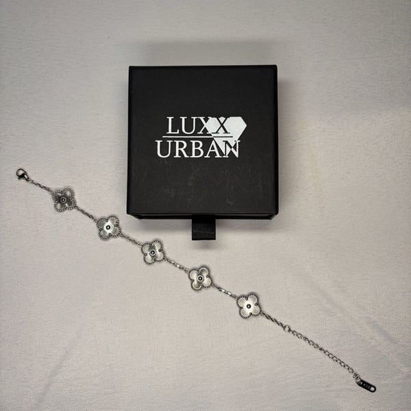 Trendy Silver Tone Four Leaf bracelet